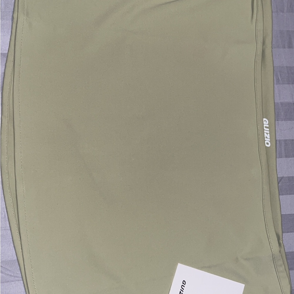 sage green Danielle Guizio mini skirt